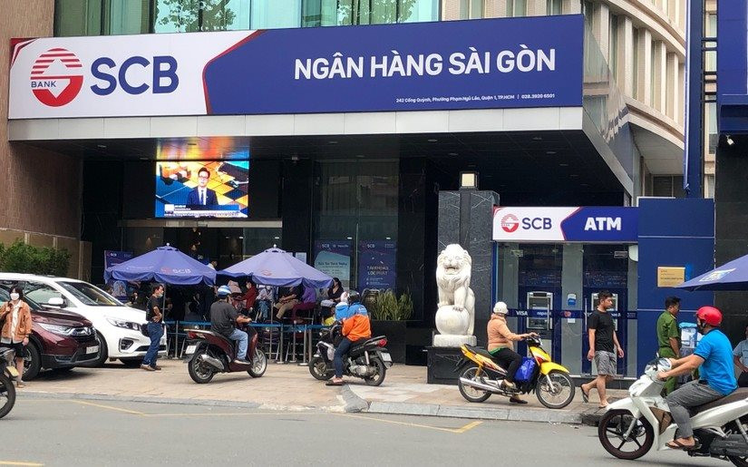 Bộ trưởng Bộ Tài chính Hồ Đức Phớc nhắc đến vi phạm của các công ty kiểm toán tại ngân hàng SCB trong phiên trả lời chất vấn trước quốc hội sáng ngày 18/3. Ảnh: Int