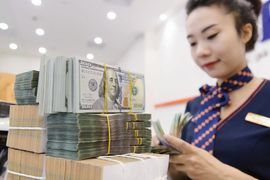 Tỷ giá trung tâm nhích nhẹ