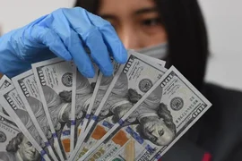 Tỷ giá trung tâm tăng sau đợt giảm liên tiếp trong tuần