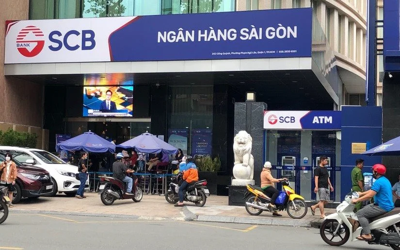 Bộ trưởng Bộ Tài chính Hồ Đức Phớc nhắc đến vi phạm của các công ty kiểm toán tại ngân hàng SCB trong phiên trả lời chất vấn trước quốc hội sáng ngày 18/3. Ảnh: Int